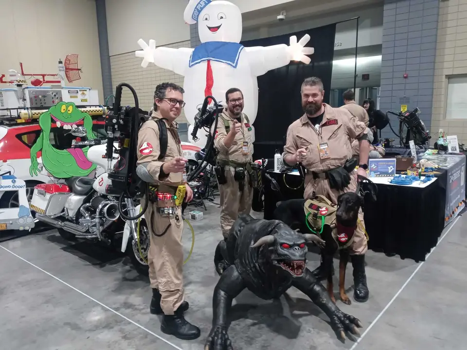 A custom Ghostbusters-themed motorcycle with the no-ghost logo on the windshield