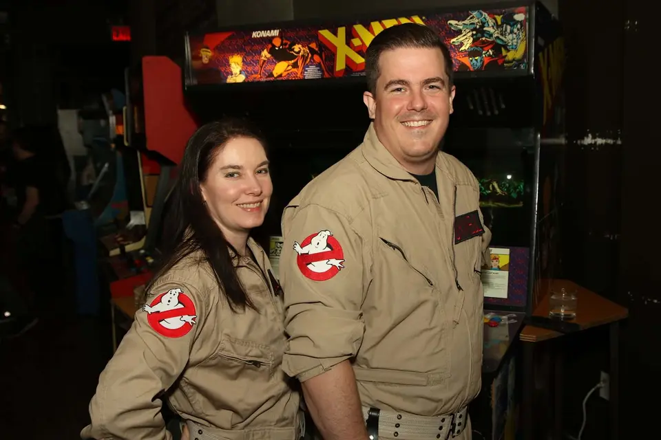 Two Ghostbusters Virginia members posing together at a community event